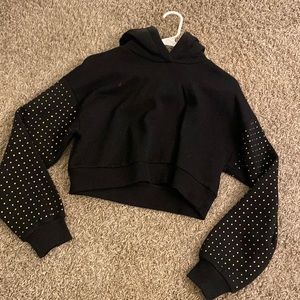 Worn once black cropped hoodie with sleeve detailing! Size small